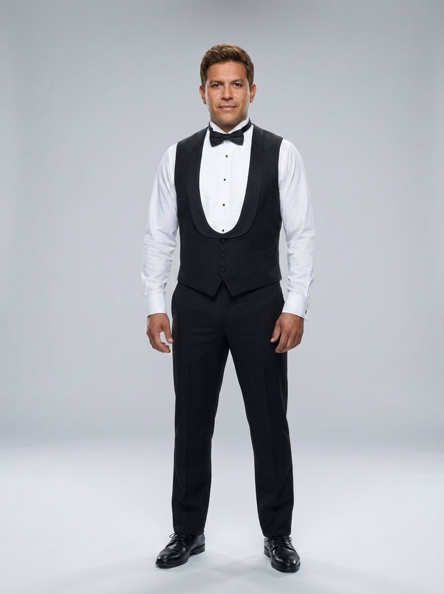 Caballero con chaleco negro de cuello chal sobre camisa blanca plisada de gala y moño negro para personal de casino.